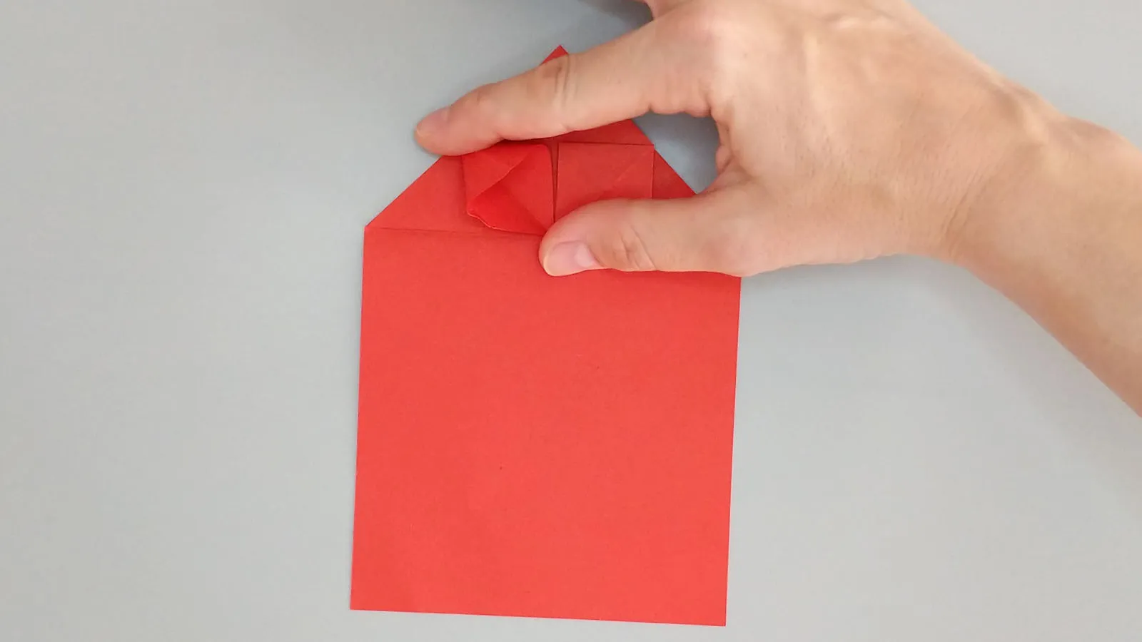 Origami širdies lankstymas iš popieriaus 14 žingsnis