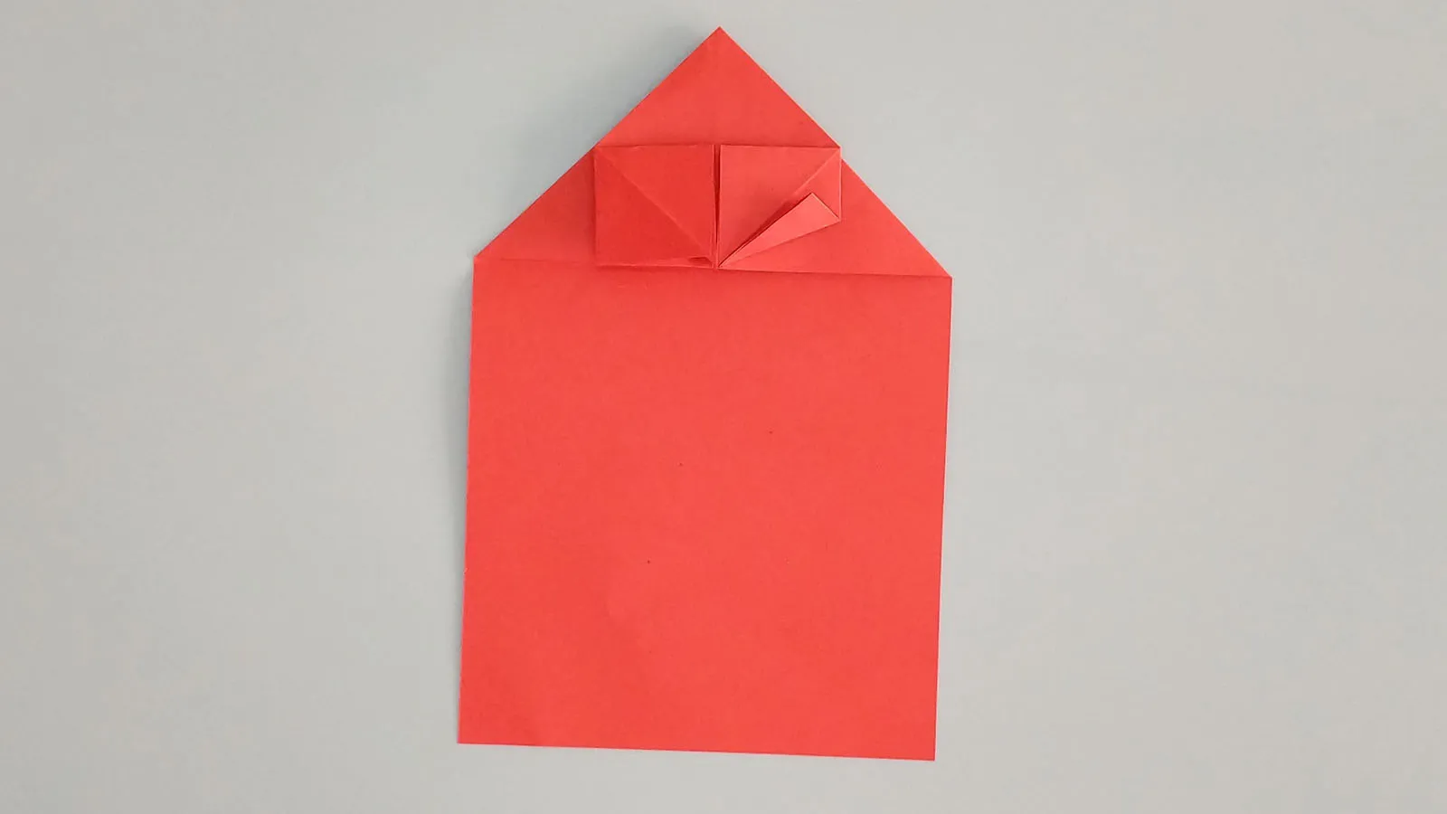 Złóż papierową serdeczkową origami krok 16