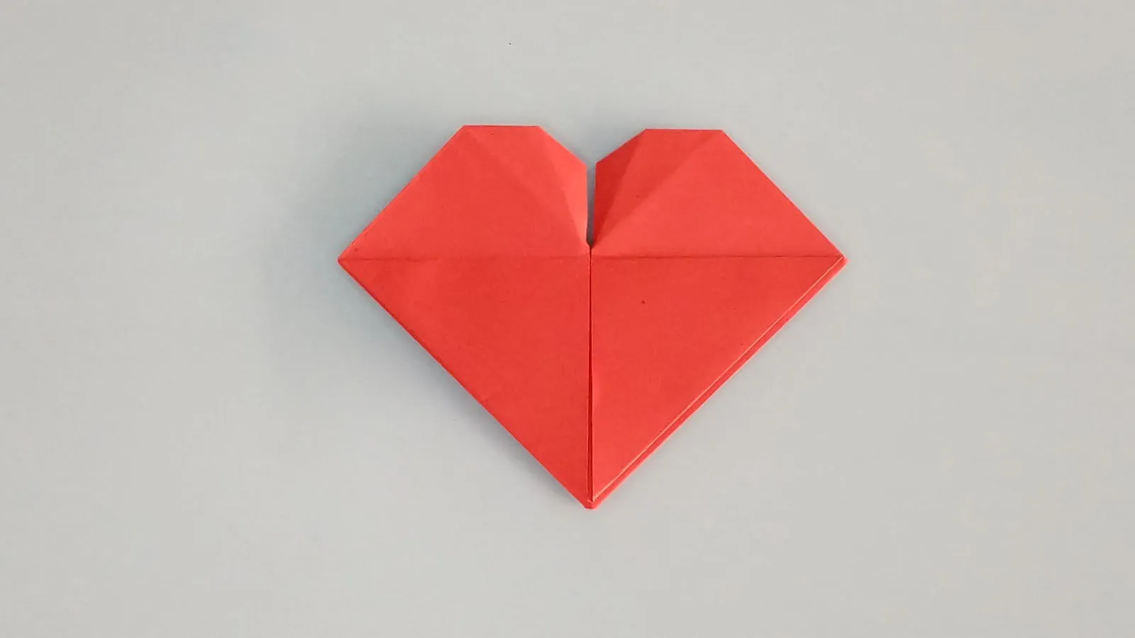 Fold paper to create origami heart, step 39