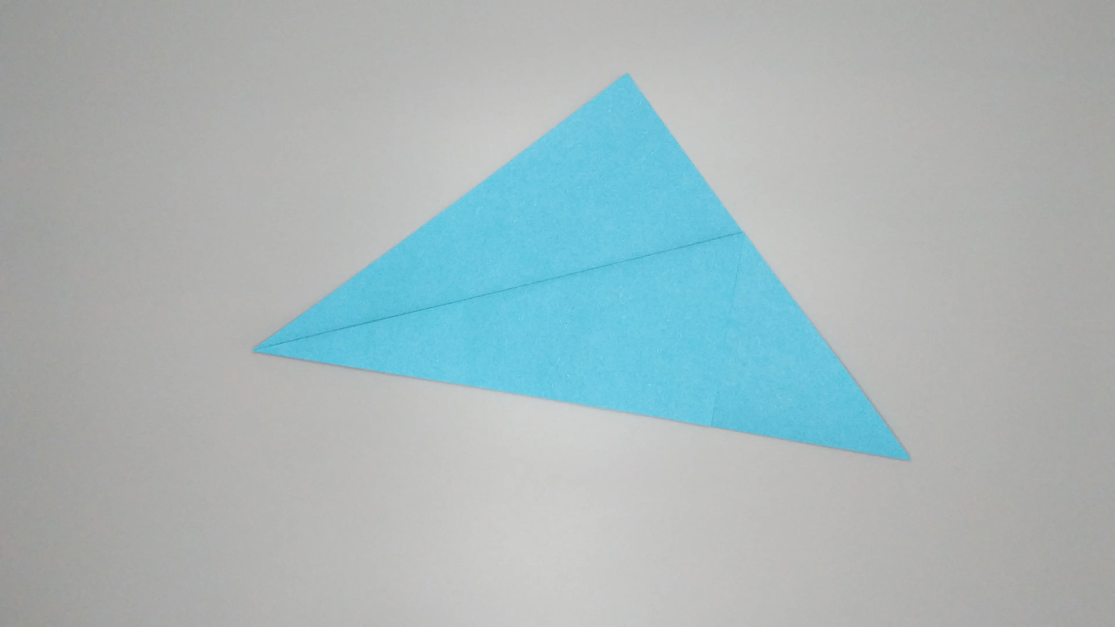 Instrucciones con fotos para plegar un cisne de origami. Paso № 3