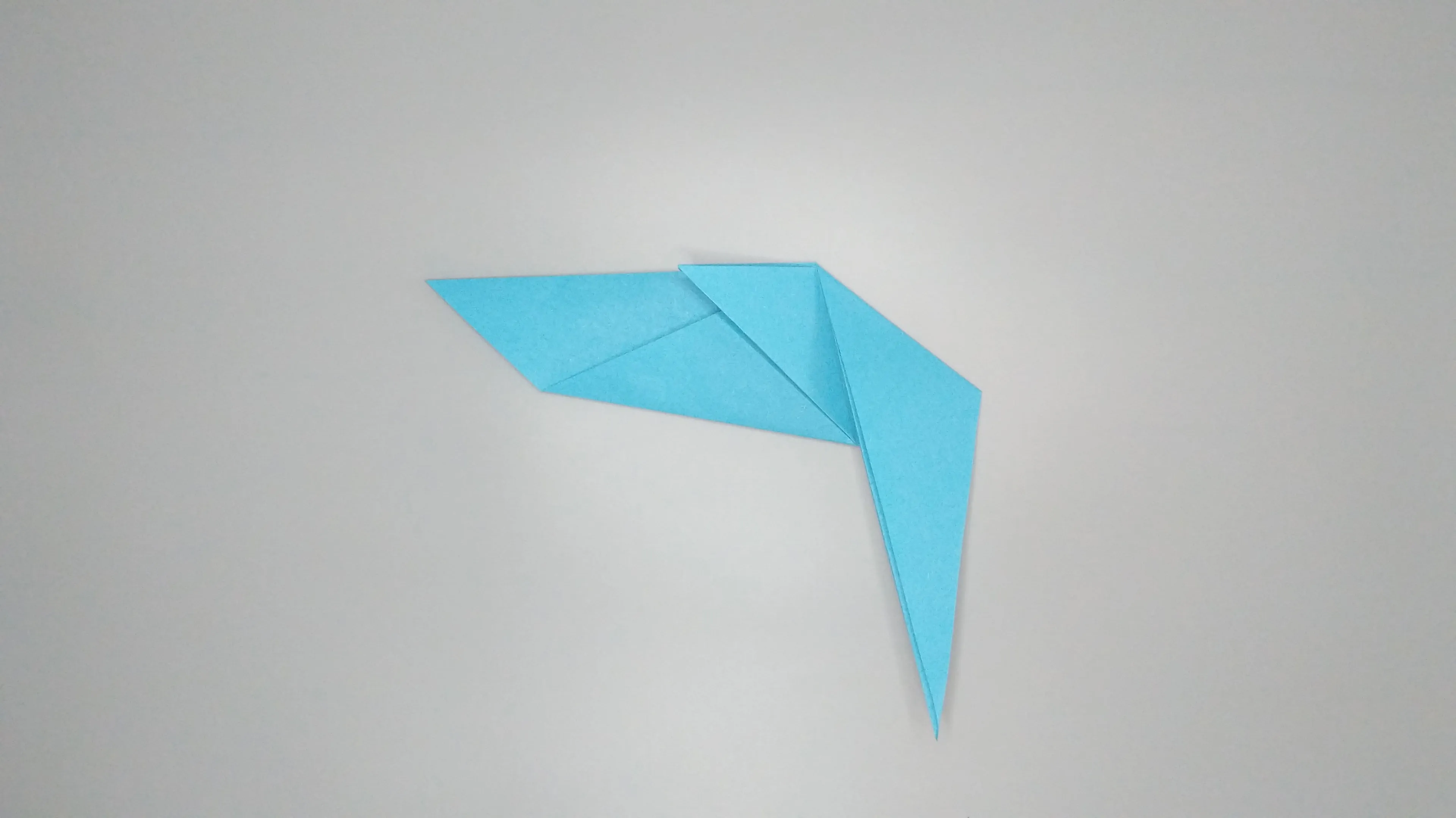 Instructions with photos for folding an origami swan. Step № 16