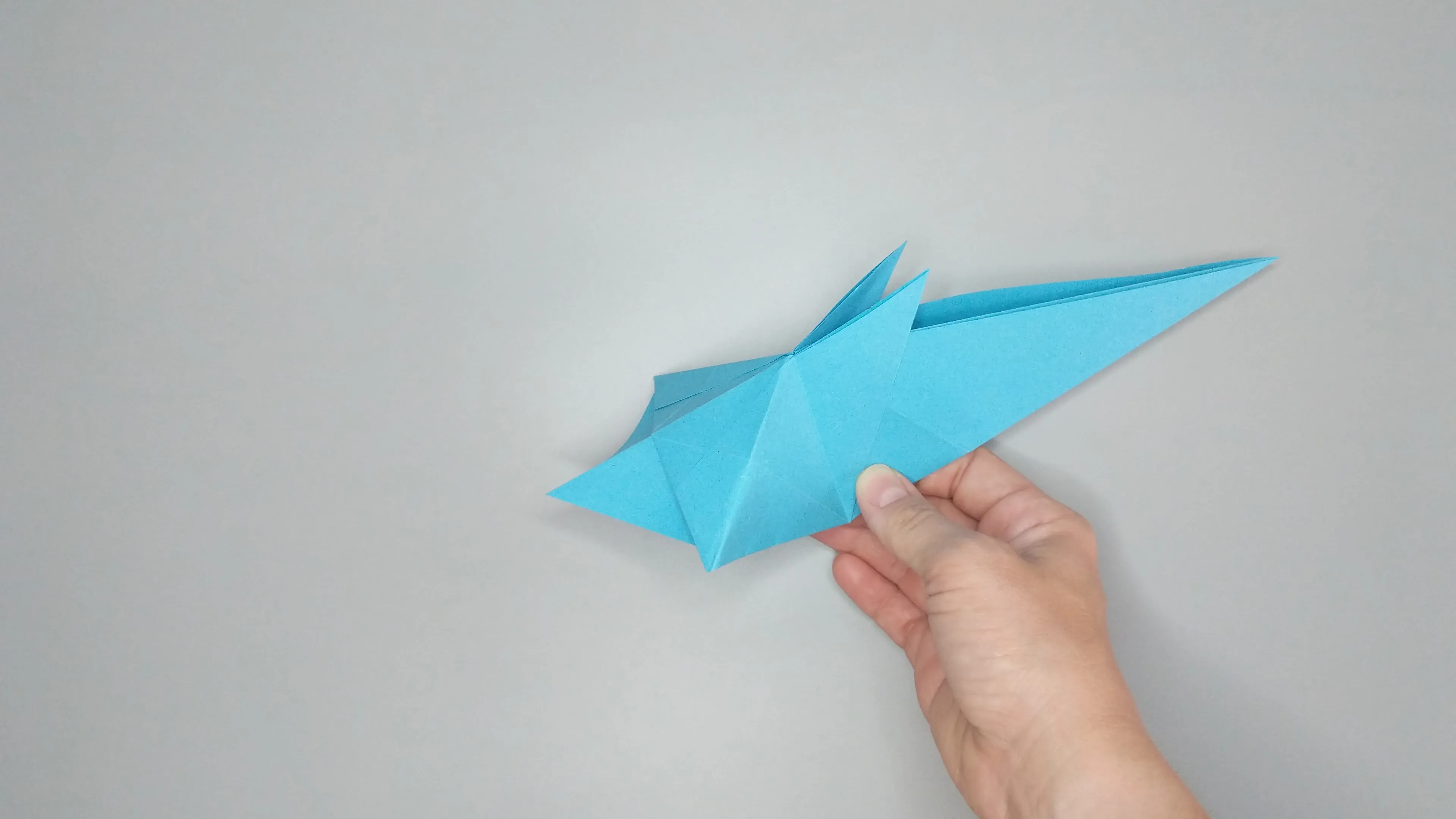 Instructions with photos for folding an origami swan. Step № 23