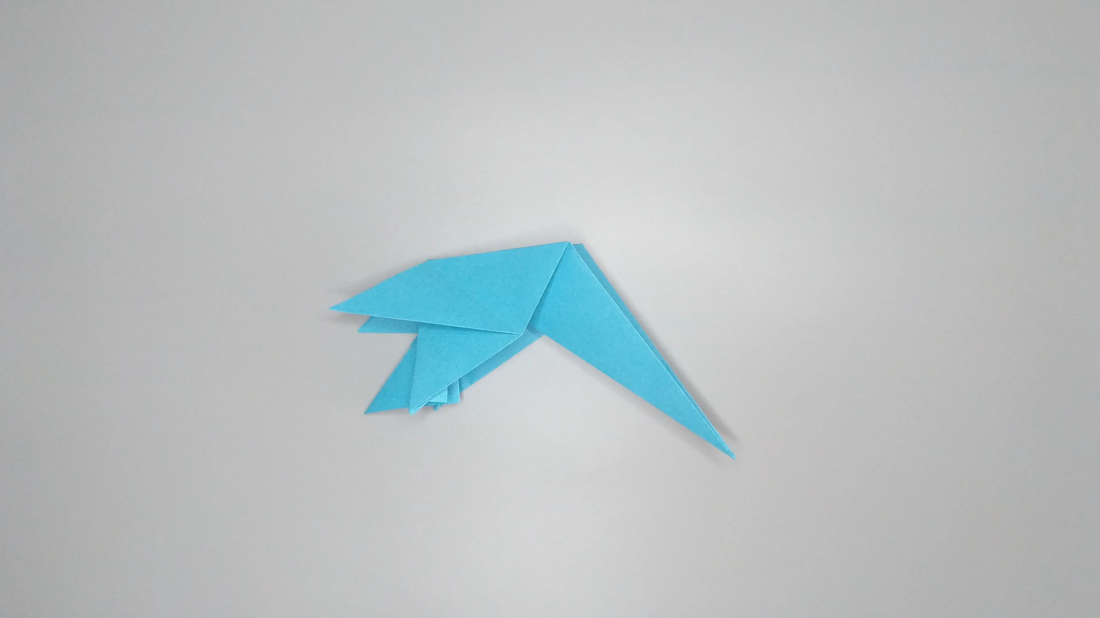 Instrucciones con fotos para doblar un cisne de origami. Paso № 28