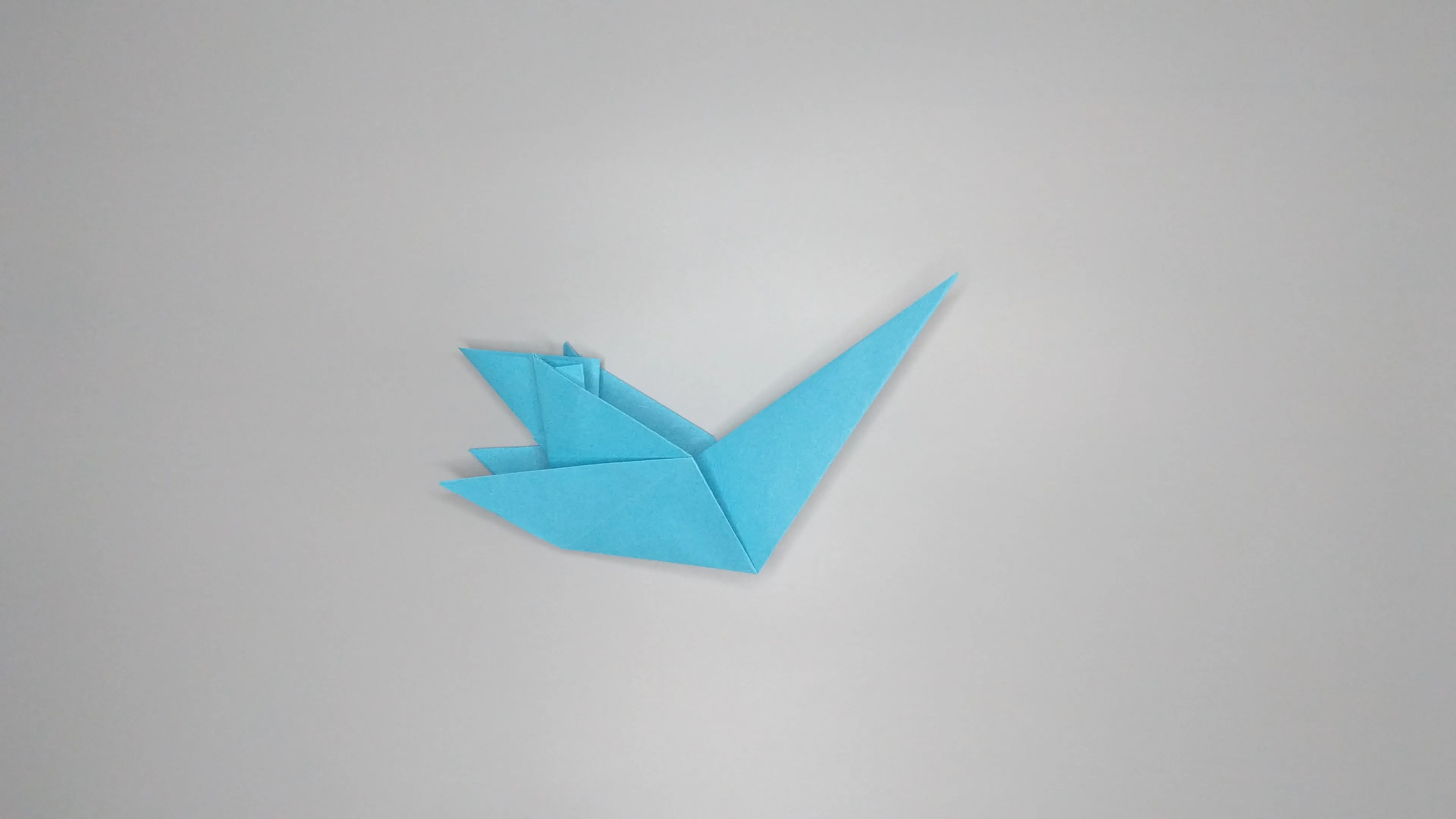 Instrukcja z zdjęciami do złożenia łabędzia origami. Krok nr 29