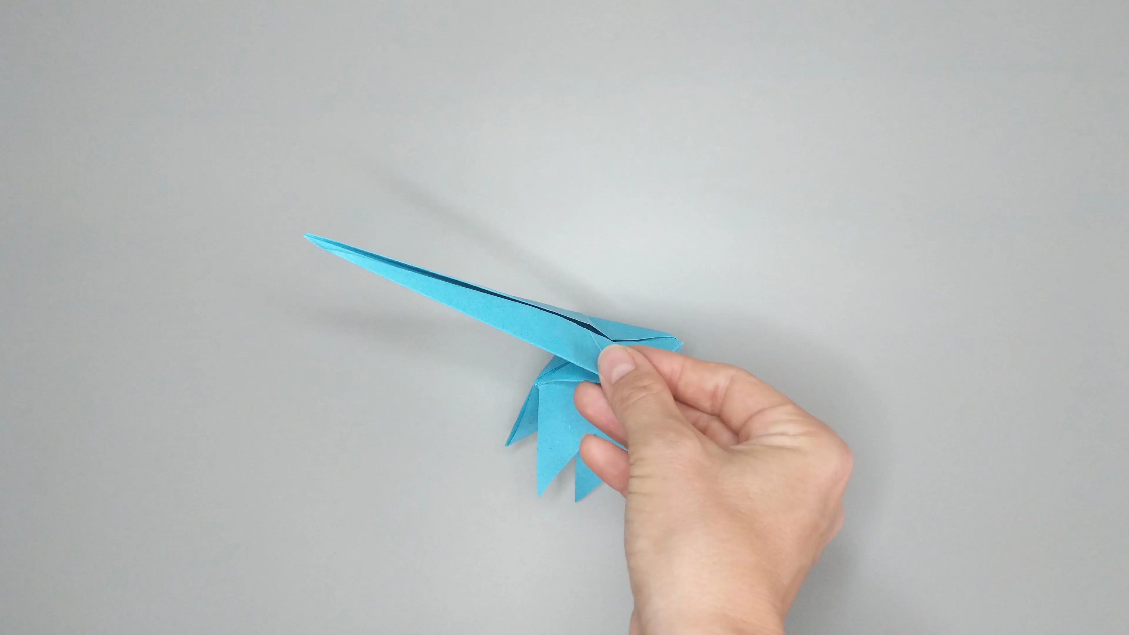 Instrucciones con fotos para doblar un cisne de origami. Paso nº 39