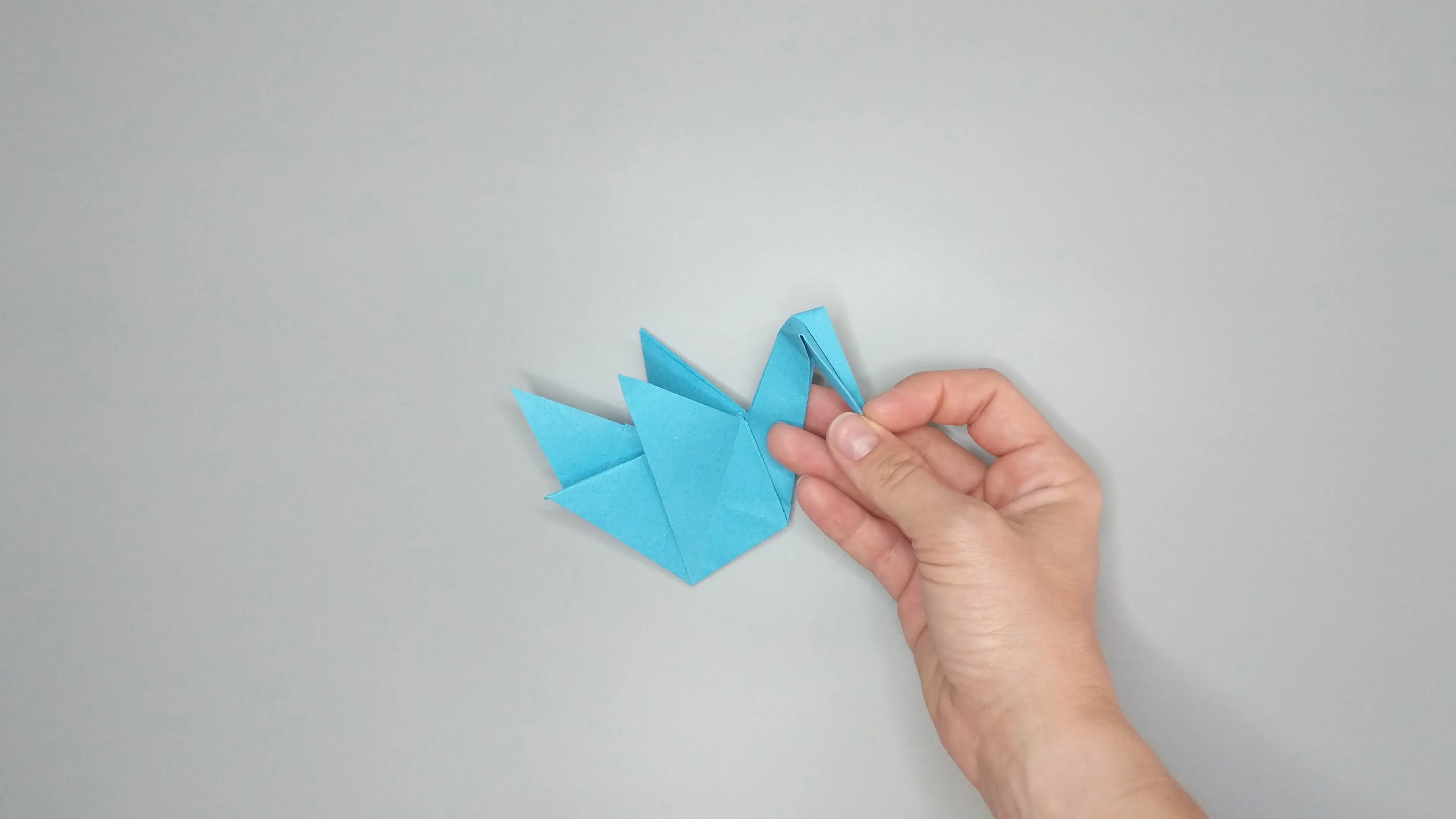 Instructions with photos for folding an origami swan. Step № 43