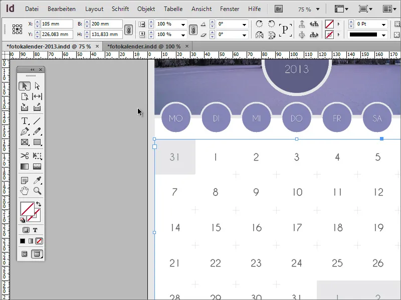 Designt fotokalender med forside i Adobe InDesign.